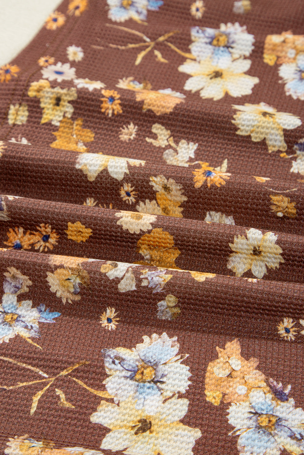 Plus Size Floral Textured Tied Neck Babydoll Blouse